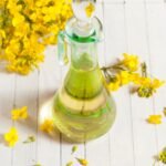 rapeseed oil with rape flowers